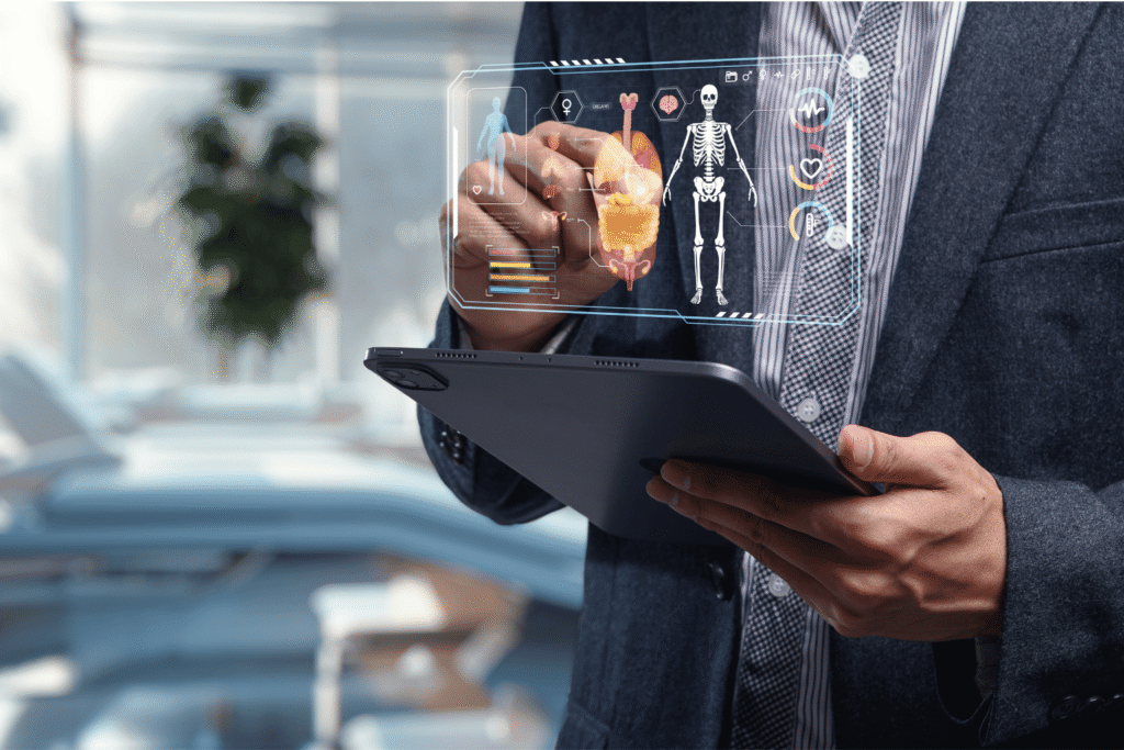 Doctor looks at patient data and body diagrams hovering above a tablet device